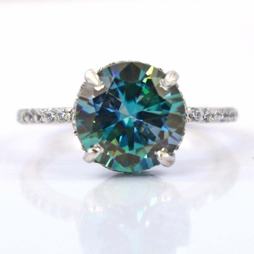 Bague diamant traité bleu - en,