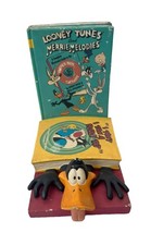 RARE COLLECTION - WARNER BROS DAFFY DUCK PRESSE LIVRES -  1 FACE - A RESTAURER