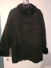 Manteau en moumoute renversée