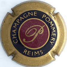 Capsule de champagne Pommery N°63 - Cuivre, intérieur bordeaux