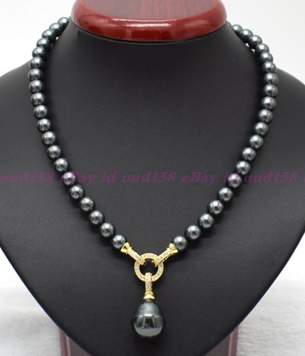 Pretty natural 8mm black shell - natural,