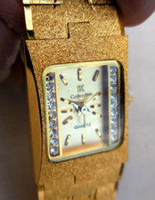 Mtr IK COLLECTION-190L,ASPECT GRANITE, FINS CRISTAUX, PLAQUE OR 22K TB FONCTION