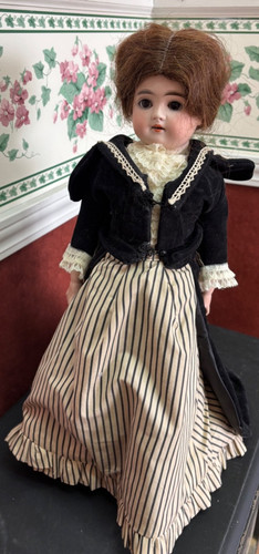 Antique bisque doll with kid - with,