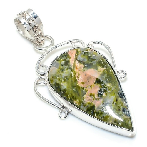 Pendentif bijou ancien fait