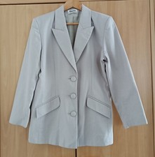 Veste tailleur beige à épaulettes. Pimkie. Taille 42