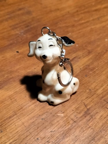 Figurine porte cle - porte, chiot