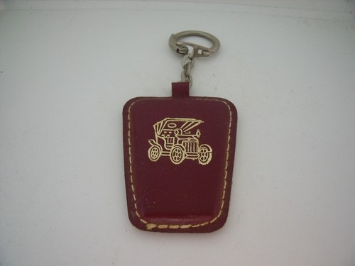 Porte clés key - /,