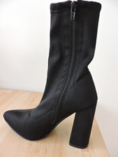 Bottines noires tige souple à talons