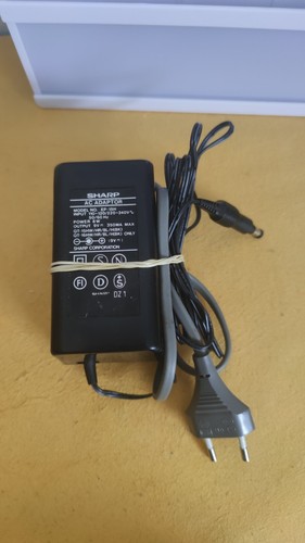 Sharp chargeur secteur - ★,