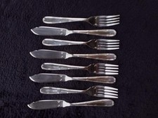 4 COUVERTS À POISSON MÉTAL