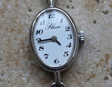 Ancienne montre FEMME mécanique  MARQUE:  SLAVA.