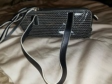 Sondra Roberts  Leather