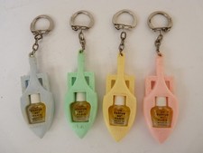 Quatre Flacons de parfum LIF 80° Paris Porte Clefs (19070)