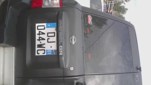 Porte coffre gauche nissan - de,