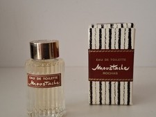 Miniature de parfum ancienne Moustache Rochas,  pleine, boîte 