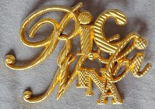 Broche vintage NINA RICCI - Bijou en métal doré