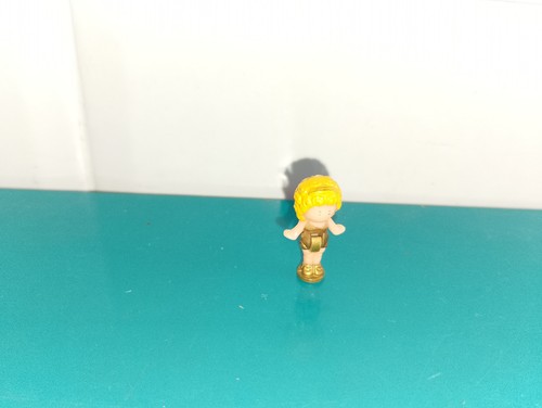 Polly pocket figurine doll