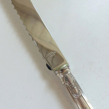 COUTEAU A PAIN SFAM SANS GENE EMPIRE couvert de service métal argenté NEUF