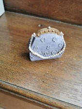 Sac à main mauve figurine en résine bibelot décoratif