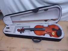 Violon et archet dans leur