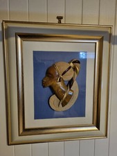 Sculpture artisanale en pierre de M'bigou du Gabon - Portrait de femme encadré