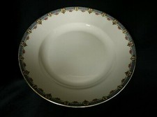 Grand plat rond en porcelaine de Limoges E. Madesclaire 1906 