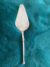 pelle à tarte métal argenté