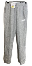 DESTOCKAGE NEUF JOGGING / BAS DE SURVET FILLE @ MARQUE PUMA TAILLE 12 ANS @ GRIS