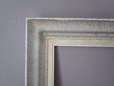 Grand Cadre en bois sculpté