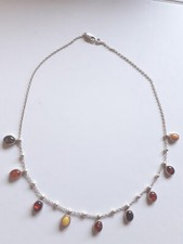 Joli et original collier ambre