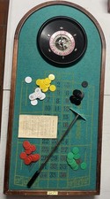 Table Darmon et ROULETTE casino  diam 25 cm bakélite jetons et ramasse jetons