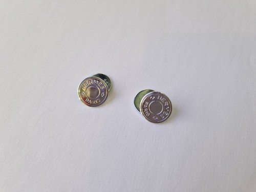 Bouton manchette signé - de,