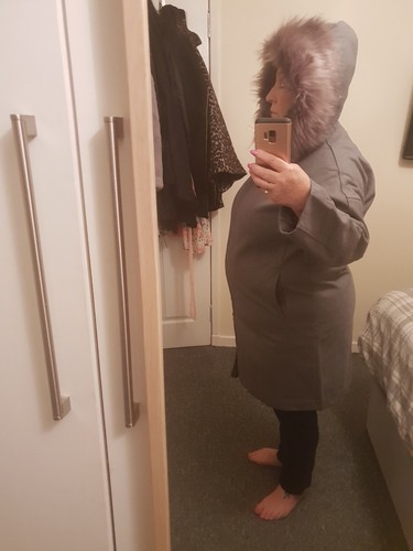 Manteau gris capuche - à,