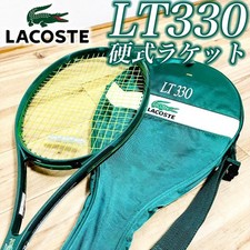 [] Raquette de tennis dure