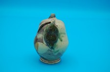 Tirelire à casser en forme de