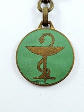 PORTE-CLES - Augis - CADUCÉE - Métal ÉMAILLÉ - Pharmacies LABO Médicaments - 60s