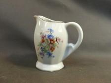 Ancien petit pot à lait ou crème de service à café en porcelaine décor de fleurs