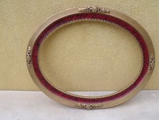 CADRE ANCIEN OVALE AUX FLEURS  SCULPTEES DORE
