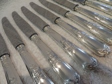 12 couteaux de table métal