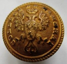 Bouton bombé en métal doré