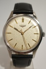LONGINES ACIER, CALIBRE 23ZS, très bon état, FONCTIONNE PARFAITEMENT, 1958