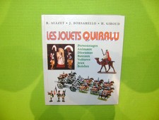 LIVRE LES JOUETS QUIRALU R.ALAZET-J.BORSARELLO-H.GIROUD ED JACQUES GRANCHER 1995