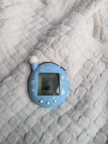 Tamagotchi blue clouds - blue,