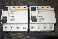 INTERRUPTEUR DIFFERENTIEL TETRAPOLAIRE 100A 300mA MERLIN GERIN TRIPHASE +N 4POLE