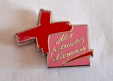 PIN'S ARTHUS BERTRAND -  Don sang. Preuves d'amour rose