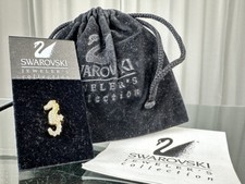 Figurine Swarovski épinglette hippocampe 2 cm excellent état dans sa pochette