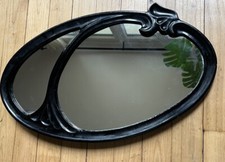 Miroir ovale en fonte