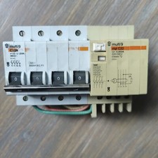 Disjoncteur multi9 C32N n°22 U (20A) 380V + vigi C32
