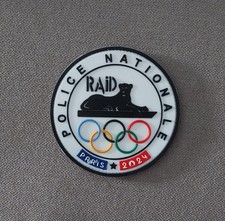 ECHANGE Ecusson RAID obsolète