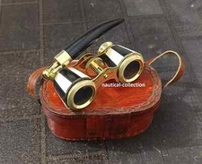 Anciennes jumelles de verres d'opéra vintage blanche nacre et manche laiton